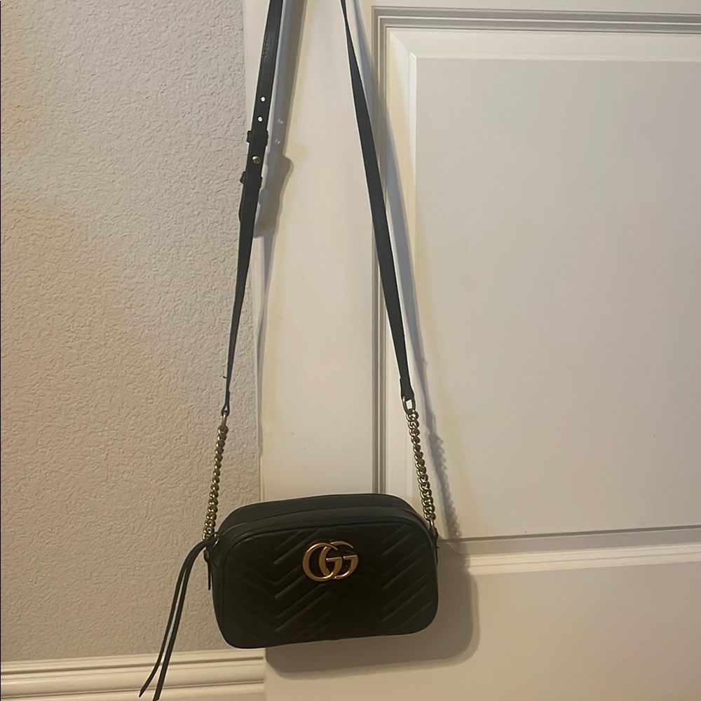 Gucci Black and Gold Crossbody Bag with Structured Silhouette
